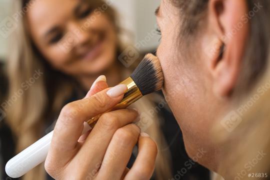 Female makeup artist applying makeup with powder brusht to custo  : Stock Photo or Stock Video Download rcfotostock photos, images and assets rcfotostock | RC Photo Stock.: