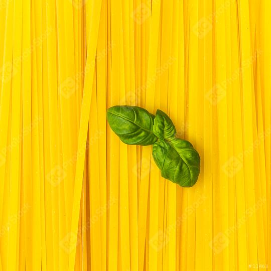 Fettuccine noodles with basil leaf background  : Stock Photo or Stock Video Download rcfotostock photos, images and assets rcfotostock | RC-Photo-Stock.:
