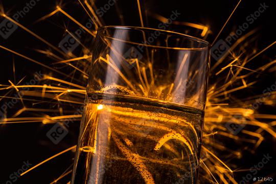 firework behind a champagne glass  : Stock Photo or Stock Video Download rcfotostock photos, images and assets rcfotostock | RC Photo Stock.: