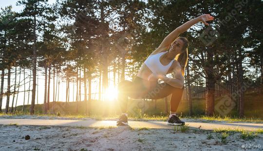 fit and sporty young woman doing stretching in the park at the beach  : Stock Photo or Stock Video Download rcfotostock photos, images and assets rcfotostock | RC Photo Stock.:
