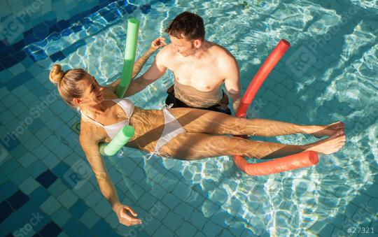 Fitness trainer in pool with clients, conducting aqua fitness session for rehabilitation purposes  : Stock Photo or Stock Video Download rcfotostock photos, images and assets rcfotostock | RC Photo Stock.: