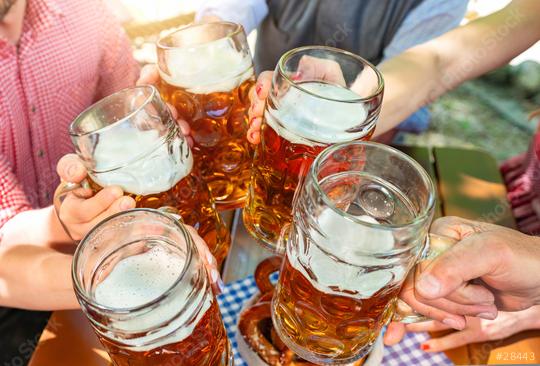 Five friends with a fresh beer in a Beer garden, close-up on beer stein oktoberst germany  : Stock Photo or Stock Video Download rcfotostock photos, images and assets rcfotostock | RC Photo Stock.: