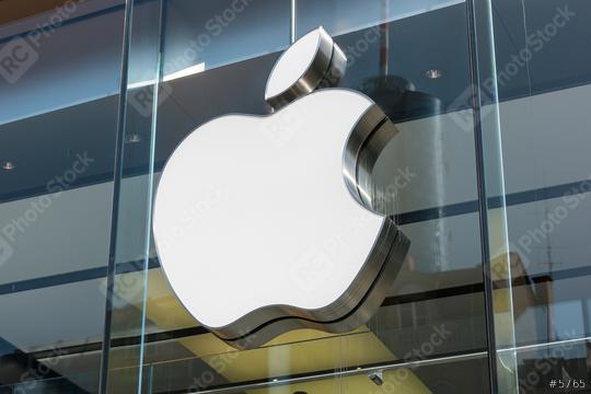 FRANKFURT, GERMANY MARCH, 2017: Apple logo on a Apple store. Apple is the multinational technology company headquartered in Cupertino, California and sells consumer electronics products.  : Stock Photo or Stock Video Download rcfotostock photos, images and assets rcfotostock | RC Photo Stock.: