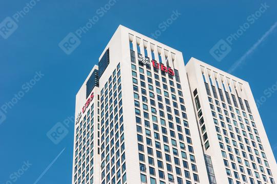 FRANKFURT, GERMANY MARCH, 2017: The UBS bank building against blue sky in the city of Frankfurt. UBS AG is a Swiss global financial services company.  : Stock Photo or Stock Video Download rcfotostock photos, images and assets rcfotostock | RC Photo Stock.: