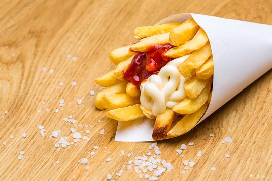 french fries in bag with salt on wood  : Stock Photo or Stock Video Download rcfotostock photos, images and assets rcfotostock | RC Photo Stock.: