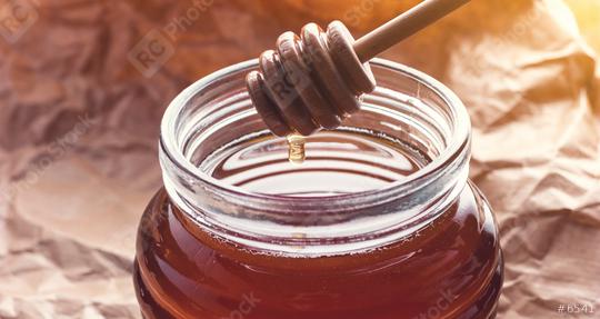 Fresh Honey on a Honey dipper  : Stock Photo or Stock Video Download rcfotostock photos, images and assets rcfotostock | RC Photo Stock.: