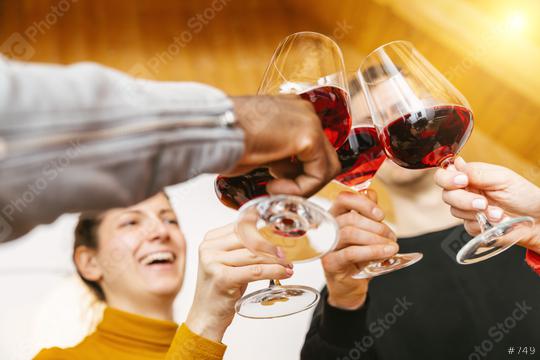 Friends hands toasting red wine glass and having fun cheering with winetasting - Young people enjoying time together at home - Youth and friendship concept  : Stock Photo or Stock Video Download rcfotostock photos, images and assets rcfotostock | RC Photo Stock.: