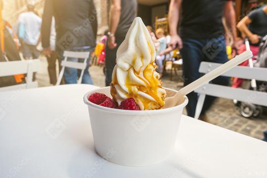 frozen yoghurt with toppings on a table in the city  : Stock Photo or Stock Video Download rcfotostock photos, images and assets rcfotostock | RC-Photo-Stock.: