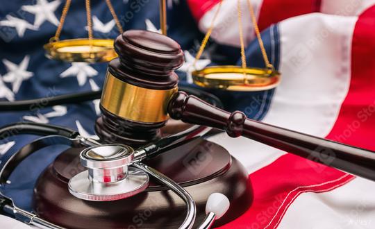 Gavel, stethoscope and scale on national flag of USA - medicine concept image  : Stock Photo or Stock Video Download rcfotostock photos, images and assets rcfotostock | RC Photo Stock.: