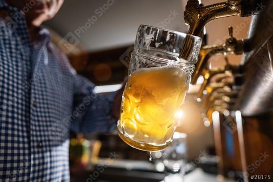 German bartender pouring beer in mug at Biergarten or Oktoberfest, Munich, Germany  : Stock Photo or Stock Video Download rcfotostock photos, images and assets rcfotostock | RC Photo Stock.: