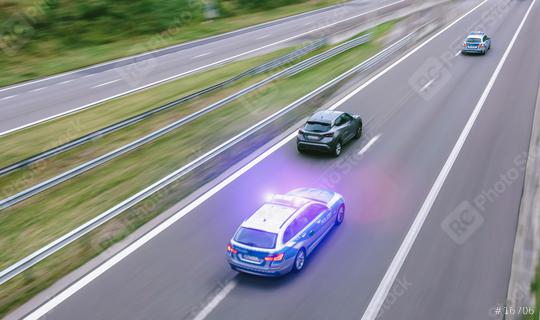 German police car on hightway driving fast  : Stock Photo or Stock Video Download rcfotostock photos, images and assets rcfotostock | RC Photo Stock.:
