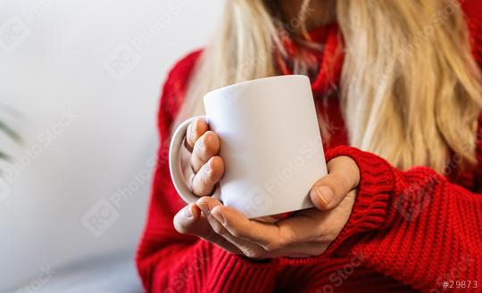 Girl in white sweater holding white coffee mug , white porcelain mug mock up for your design with copyspace for your individual text.  : Stock Photo or Stock Video Download rcfotostock photos, images and assets rcfotostock | RC Photo Stock.: