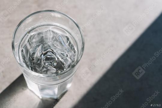 Glass with ice cubes on a table  : Stock Photo or Stock Video Download rcfotostock photos, images and assets rcfotostock | RC Photo Stock.: