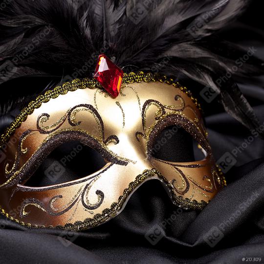 gold mask on black silk  : Stock Photo or Stock Video Download rcfotostock photos, images and assets rcfotostock | RC Photo Stock.: