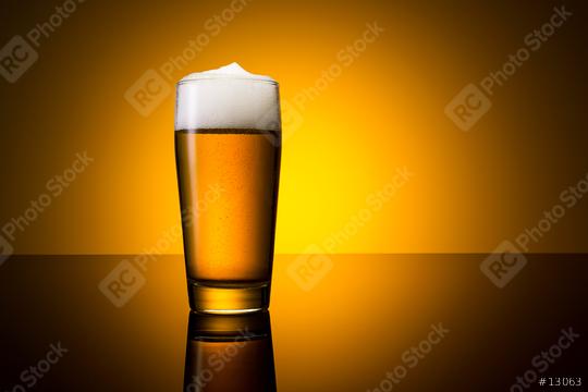 golden beer in a glass  : Stock Photo or Stock Video Download rcfotostock photos, images and assets rcfotostock | RC Photo Stock.: