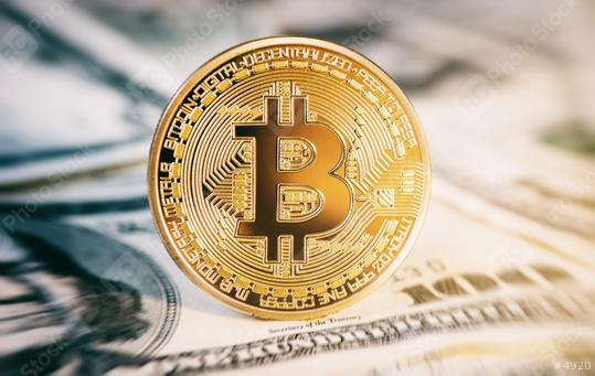 golden bitcoin coin on us dollars close up  : Stock Photo or Stock Video Download rcfotostock photos, images and assets rcfotostock | RC Photo Stock.: