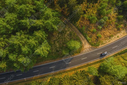 Green forest aerial drone view. Road with car in forest from above. Transportation background.  : Stock Photo or Stock Video Download rcfotostock photos, images and assets rcfotostock | RC-Photo-Stock.: