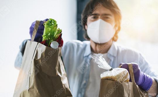 Grocery shopping as a delivery service for quarantined seniors at the Covid-19 Coronavirus Sars-CoV-2 epidemic  : Stock Photo or Stock Video Download rcfotostock photos, images and assets rcfotostock | RC Photo Stock.: