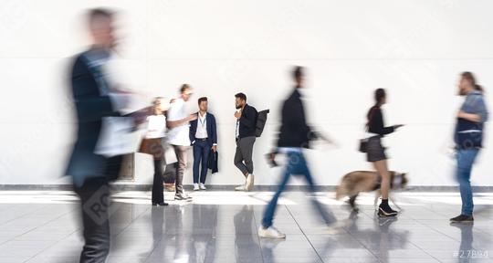 Group of business people is standing in anonymous blurred crowd at a trade fair  : Stock Photo or Stock Video Download rcfotostock photos, images and assets rcfotostock | RC Photo Stock.: