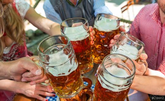 Group of happy friends drinking and toasting beer at Oktoberfest in bavaria  : Stock Photo or Stock Video Download rcfotostock photos, images and assets rcfotostock | RC Photo Stock.: