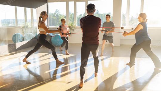 Group of people in a sport course in the gym with Flexibar or vibrating rod for deep muscle training. Healthy sports lifestyle, Fitness, Healthy concept.  : Stock Photo or Stock Video Download rcfotostock photos, images and assets rcfotostock | RC Photo Stock.: