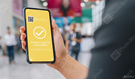 Gültiges Impfzertifikat (German for: Valid vaccination certificate for covid-19 Corona Pass of immunity against Corona ) on a mobile phone.   : Stock Photo or Stock Video Download rcfotostock photos, images and assets rcfotostock | RC Photo Stock.: