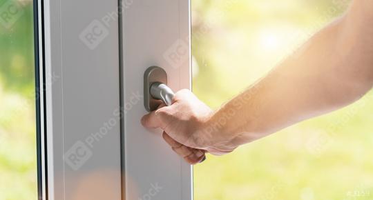 hand close a white plastic pvc window at home  : Stock Photo or Stock Video Download rcfotostock photos, images and assets rcfotostock | RC Photo Stock.: