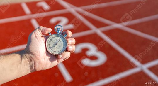 Hand holding a stopwatch on a red running track, numbers on lanes visible, sunny day  : Stock Photo or Stock Video Download rcfotostock photos, images and assets rcfotostock | RC Photo Stock.: