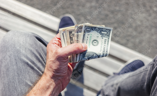 hand holding bunch of dollar notes  : Stock Photo or Stock Video Download rcfotostock photos, images and assets rcfotostock | RC Photo Stock.: