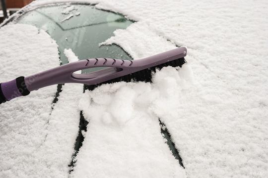 hand removing snow from car with a brush  : Stock Photo or Stock Video Download rcfotostock photos, images and assets rcfotostock | RC Photo Stock.: