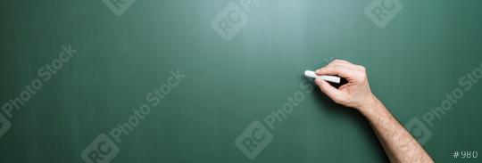 hand starts writing with chalk on a clean blackboard  : Stock Photo or Stock Video Download rcfotostock photos, images and assets rcfotostock | RC Photo Stock.: