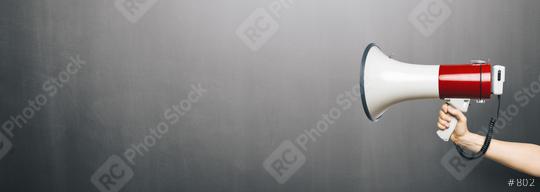 hand with a megaphone in front of an empty blackboard, with copyspace for your individual text.  : Stock Photo or Stock Video Download rcfotostock photos, images and assets rcfotostock | RC Photo Stock.: