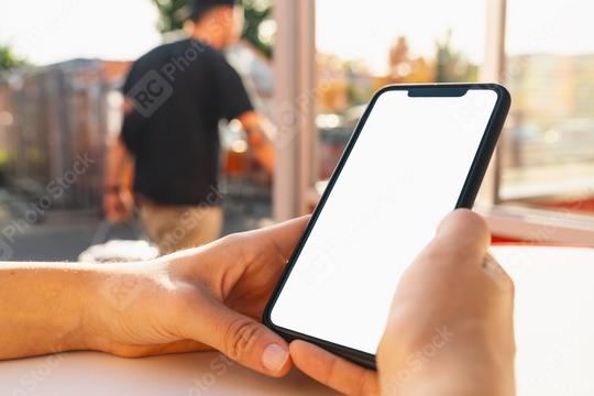 hands holding black mobile phone with blank desktop screen at summer in the city, Mockup image  : Stock Photo or Stock Video Download rcfotostock photos, images and assets rcfotostock | RC Photo Stock.: