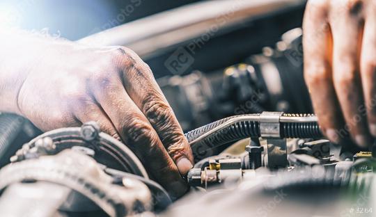 hands of a Auto mechanic in a car  : Stock Photo or Stock Video Download rcfotostock photos, images and assets rcfotostock | RC Photo Stock.: