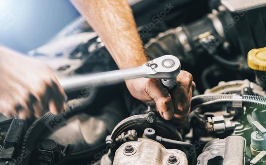 Hands of car mechanic in auto repair service with wrench  : Stock Photo or Stock Video Download rcfotostock photos, images and assets rcfotostock | RC-Photo-Stock.: