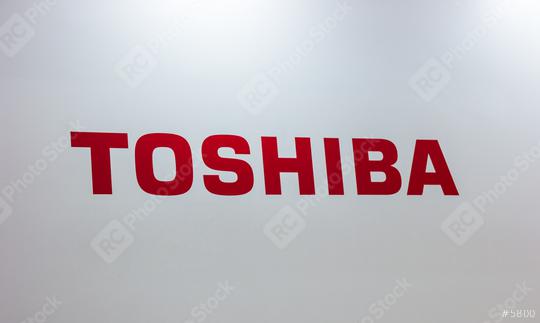HANNOVER, GERMANY MARCH, 2017: The logo of the brand "Toshiba". Toshiba is a famous Japanese multinational corporation whose products and services include IT and communications equipment.  : Stock Photo or Stock Video Download rcfotostock photos, images and assets rcfotostock | RC Photo Stock.: