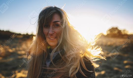 Happy hiker woman in the landscape front view and sunset in the background  : Stock Photo or Stock Video Download rcfotostock photos, images and assets rcfotostock | RC Photo Stock.:
