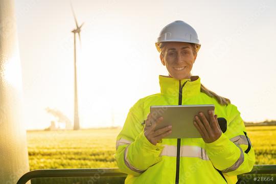 Happy Windmill engineer inspection and progress check wind turbine at sunset  : Stock Photo or Stock Video Download rcfotostock photos, images and assets rcfotostock | RC Photo Stock.: