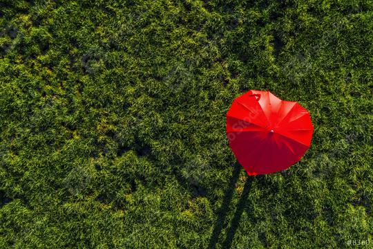 heart shape red umbrella on a green summer meadow - view from a drone  : Stock Photo or Stock Video Download rcfotostock photos, images and assets rcfotostock | RC Photo Stock.: