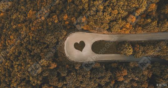 heart symbol in a curved Road in the forest at autumn, drone shot  : Stock Photo or Stock Video Download rcfotostock photos, images and assets rcfotostock | RC Photo Stock.: