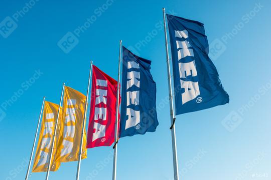 HEERLEN, NETHERLANDS FEBRUARY, 2017: IKEA flags against sky at the IKEA Store. IKEA is the world