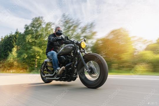 High power motorcycle chopper on the country road riding at summer. having fun driving the empty road on a motorcycle tour  : Stock Photo or Stock Video Download rcfotostock photos, images and assets rcfotostock | RC Photo Stock.: