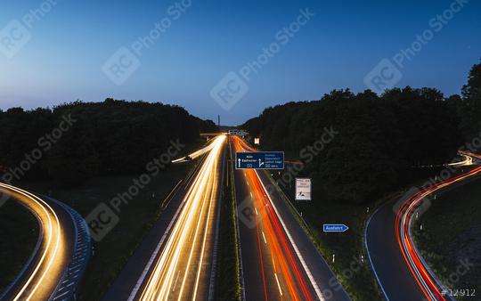 highway crossing with lighttrails at night  : Stock Photo or Stock Video Download rcfotostock photos, images and assets rcfotostock | RC Photo Stock.: