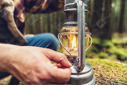 Hiker using a Gasoline lantern in the forest  : Stock Photo or Stock Video Download rcfotostock photos, images and assets rcfotostock | RC Photo Stock.: