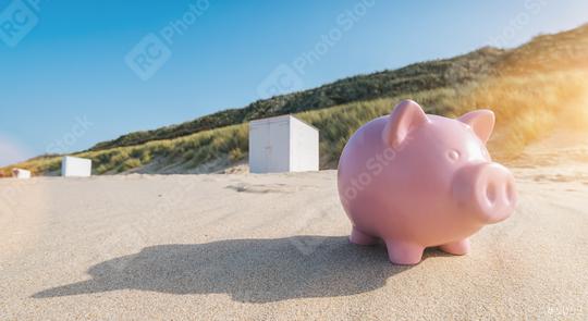 Holiday savings piggy bank on a beach  : Stock Photo or Stock Video Download rcfotostock photos, images and assets rcfotostock | RC Photo Stock.: