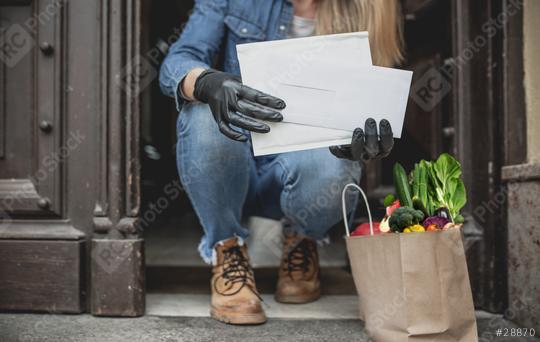 home delivery service in times of covid 19 and virus of food and mail and pacts with gloves and ffp2 mask   : Stock Photo or Stock Video Download rcfotostock photos, images and assets rcfotostock | RC Photo Stock.: