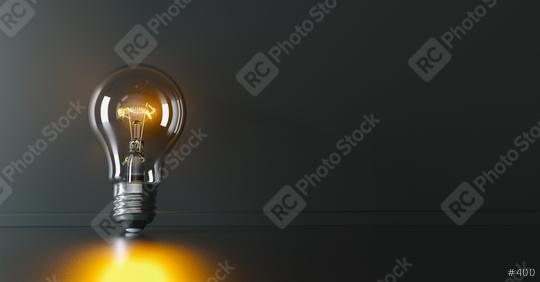 Illuminated light bulb leaning against a wall, concept for creativity, innovation and solution, copyspace for your individual text.  : Stock Photo or Stock Video Download rcfotostock photos, images and assets rcfotostock | RC Photo Stock.: