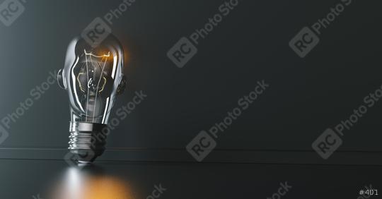Illuminated light bulb with head shape leaning against a wall, concept for creativity, innovation and solution, copyspace for your individual text.  : Stock Photo or Stock Video Download rcfotostock photos, images and assets rcfotostock | RC Photo Stock.: