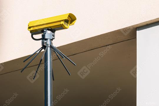IP CCTV camera in Yellow color install by have water proof cover to protect camera with home security system concept image  : Stock Photo or Stock Video Download rcfotostock photos, images and assets rcfotostock | RC Photo Stock.:
