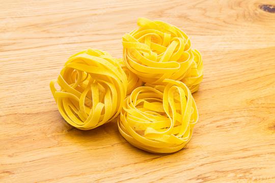 Italian egg pasta nest  : Stock Photo or Stock Video Download rcfotostock photos, images and assets rcfotostock | RC Photo Stock.: